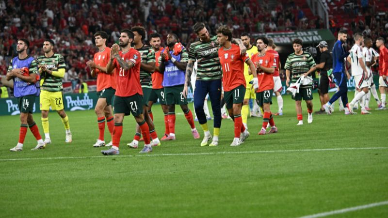 Los jugadores de Portugal celebran su victoria sobre Hungría por el grupo F.